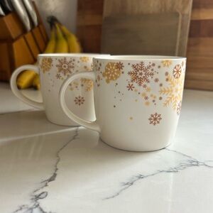 Godiva Snowflake Patterned White and Gold Mugs
